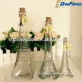 Clear empty eiffel tower shaped glass wine bottle / juice bottle with cork lid